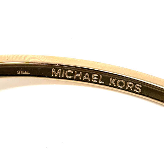 Designer Michael Kors Gold-Tone Round Shape Classic Bangle Bracelet image number 3
