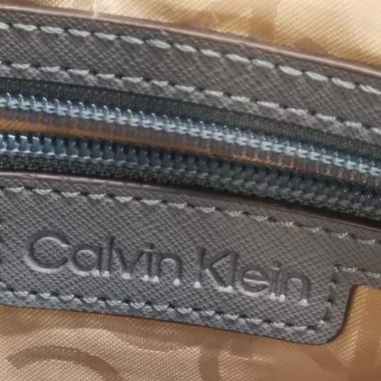 Calvin Klein CK Signature Print PU Slim Crossbody Bag image number 5
