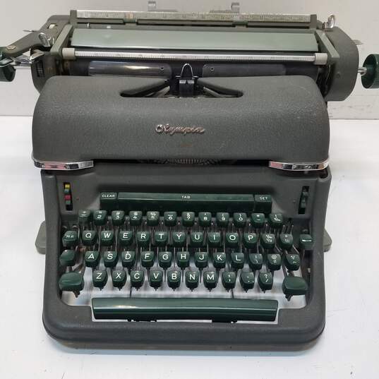 Vintage Olympia SG-1 De Luxe Typewriter Olive Green Wide Carriage Made in Western Germany image number 1