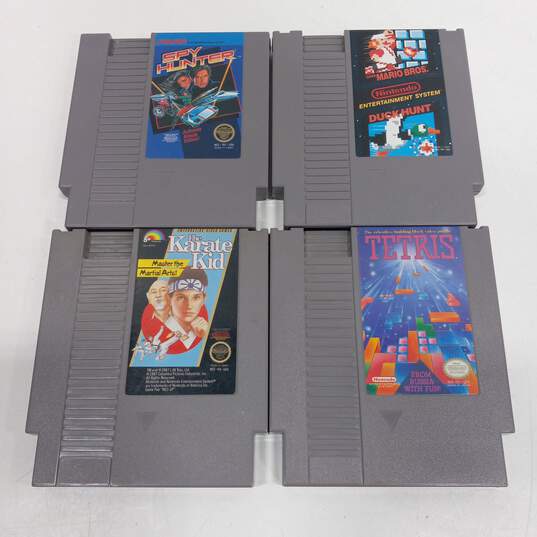 Bundle of 4 Assorted Super Nintendo Entertainment System SNES Video Games image number 1