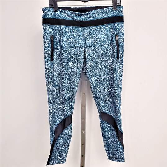 Buy the Lululemon Inspire Tight II Legging Mesh Reflective Zip Pockets 7/8  Length Pebble Print Black/Blue Women's Size 12