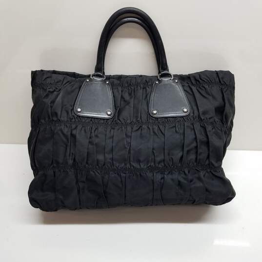 Buy the AUTHENTICATED PRADA TESSUTO GAUFRE TRIM TOTE BAG | GoodwillFinds