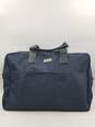 Authentic Jimmy Choo Parfums Navy Duffle Bag image number 1
