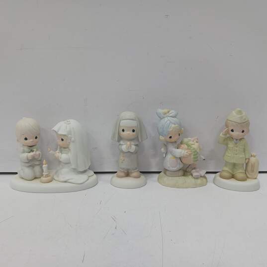 4 Assorted Precious Moments Figurines image number 1