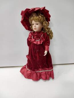 Vintage Doll In Red Velvet Dress