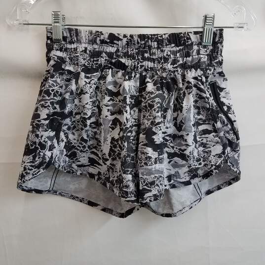 Buy the Lululemon women's high waisted abstract print running shorts size 4