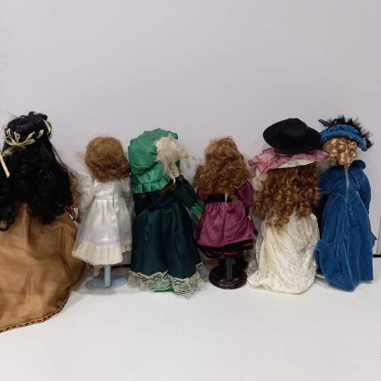 Bundle of 14 Assorted Porcelain Dolls w/Accessories image number 3