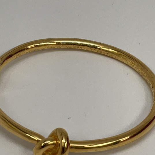 Designer Kate Spade Gold-Tone Sailors Knot Hinged Classic Bangle Bracelet image number 4