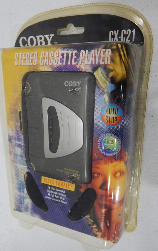 Sealed Coby CX-C21 Stereo Cassette Player Ultra Compact Walkman w/ Headphones image number 3