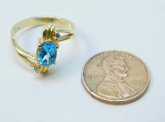 14K Yellow Gold Oval Blue Topaz 0.03 CTTW Diamond Ring 4.0g image number 4