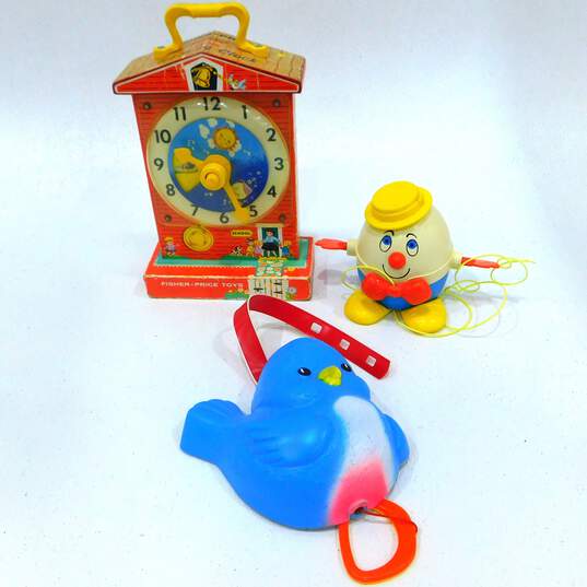 Vintage Fisher Price Toy Lot Teaching Clock, Blue Bird & Humpty Dumpty Pull Toy image number 1