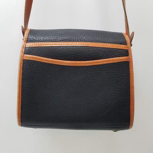 Outlet Express - Dooney and Bourke Pebble Leather Crossbody - UPDATE: SOLD  Color: Black/Black One of our most popular purse styles!! Can be paid for  on our website and picked up in-store