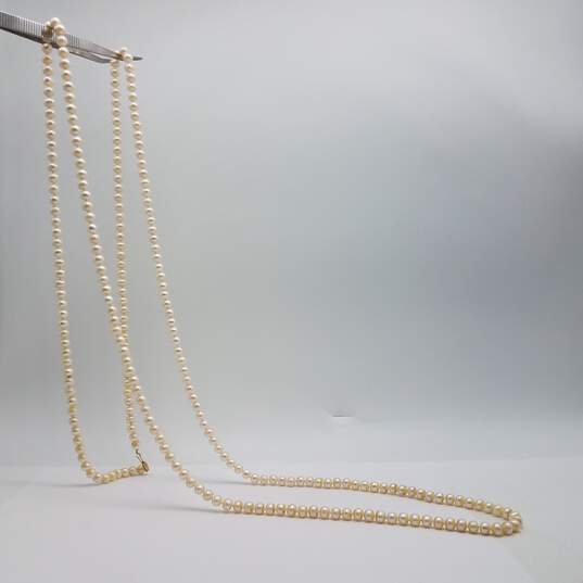 IPS 14k Gold Knotted 6.5mm Fw Pearl 64 Inch Necklace 97.0g image number 3