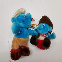 Two Wallace Berrie Smurf Plush Toys