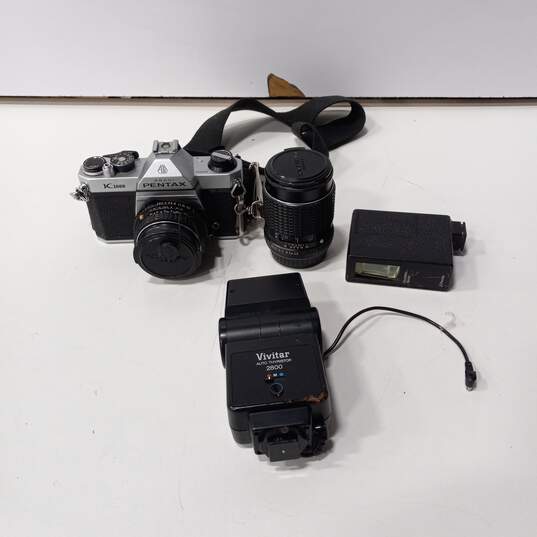 Vintage Abahi Pentax K1000 Film Camera With 2 Flashes, And Extra Lens image number 1