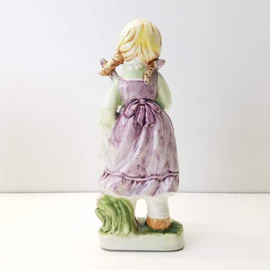 Porcelain Young Girl with Flowers Figurine image number 7