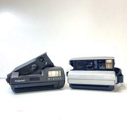 Lot of 2 Assorted Polaroid Instant Cameras-PRO CAM & 1200si