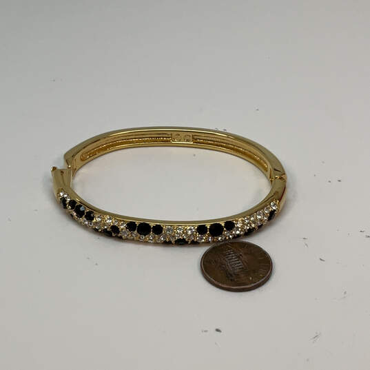 Designer Swarovski Gold-Tone Clear & Black Crystals Hinged Bangle Bracelet image number 3