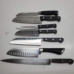 Lot of 7 JA Henckels Kitchen Knives