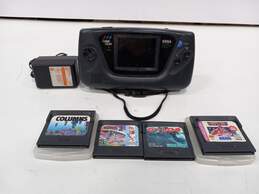 Sega Game Gear with charger and games
