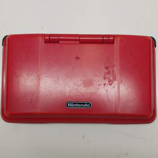 Red/Silver Nintendo DS w/Wario Land 4 image number 1