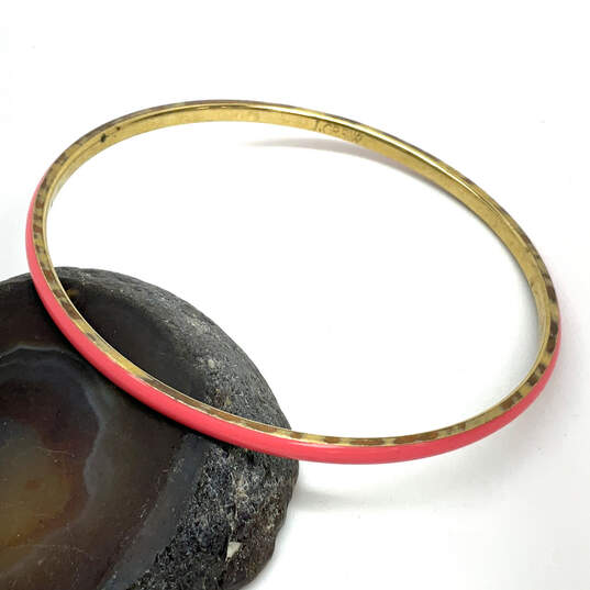 Designer J. Crew Gold-Tone Pink Round Shaped Enamel Bangle Bracelet image number 1
