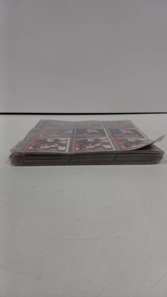 Bundle of Assorted Sports Cards in Binder Sleeves image number 6