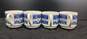 Bundle of 4 Vintage White and Blue Ceramic Stacking Tea Cups image number 2