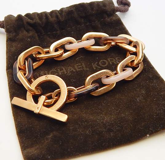 Buy the Michael Kors Designer Rose Gold Tone Chain Link Toggle Bracelet |  GoodwillFinds