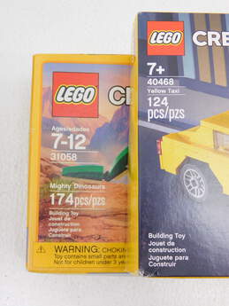 Creator Factory Sealed Sets 31058: Mighty Dinosaurs 40468: Yellow Taxi & 30580: Santa Claus alternative image