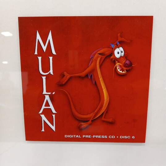 Set of 2 Framed Buena Vista Art on Call Pre-Press Mermaid & Mulan CDs image number 2