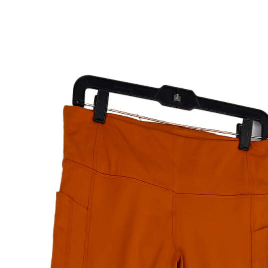 NWT Womens Orange Pockets Stretch Activewear Compression Leggings Size L image number 4