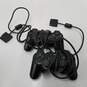 Lot of 2 PlayStation 2 Controllers for Parts and Repair image number 1