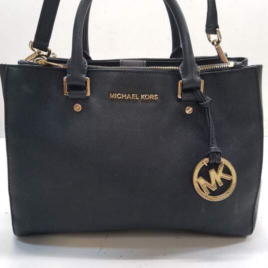 Buy the Michael Kors Sutton Black Saffiano Leather Medium Shoulder Tote Bag  Handbag