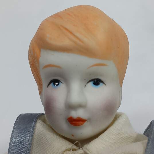Bundle of Vintage Boy & Girl Porcelain Dolls image number 5