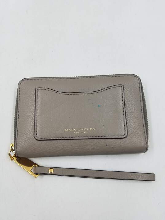 Buy the Marc Jacobs Taupe Zip Around Wallet COA | GoodwillFinds