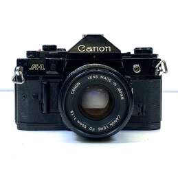 Vintage Canon A-1 SLR Camera w/ Accessories alternative image