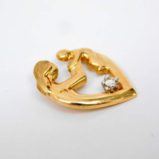 14K Yellow Gold Diamond Accent Figural Mother & Child Pendant 1.9g image number 2