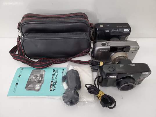 Canon Sure Shot/Prima Camera Lot With Case image number 1