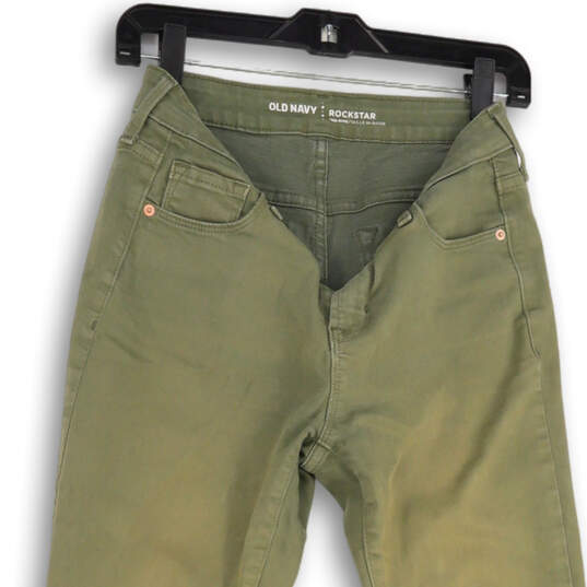 Womens Green Rockstar Mid Rise Light Wash Denim Pockets Skinny Jeans Size 6 image number 1