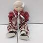 Vintage Collectible Porcelain Hands and Head Doll With Weighted Cloth Body image number 1