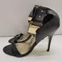 BEBE Gold Ankle Plate Black Leather Pump Heels Shoes Size 10 B image number 2