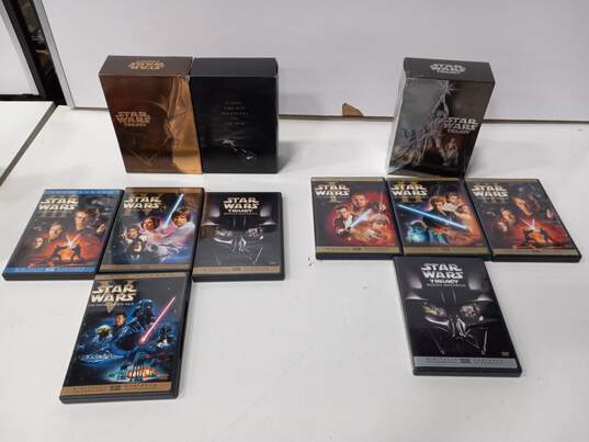 2 Star Wars Trilogy DVD Box Sets Gold & Black image number 1