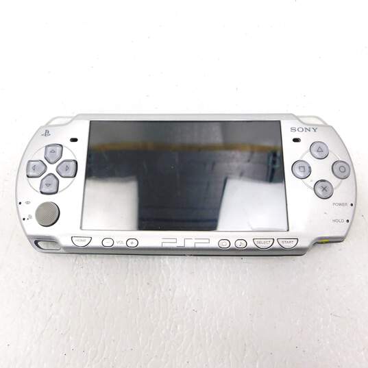 Buy the Sony PlayStation Portable PSP 2000 W/ 4 Games In Cases
