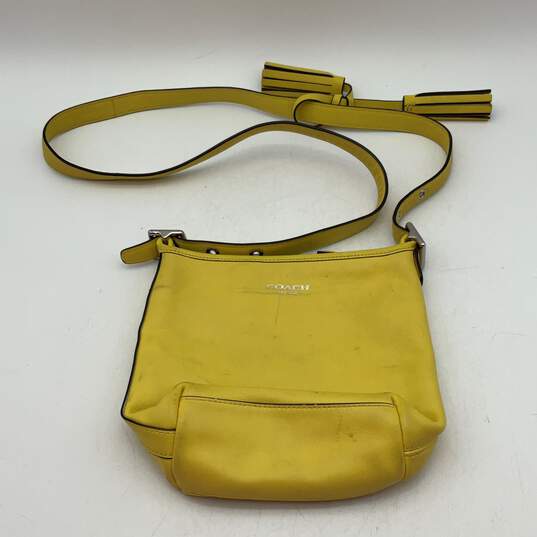 Womens Yellow Tasseled Leather Adjustable Strap Zipper Small Crossbody Bag image number 1