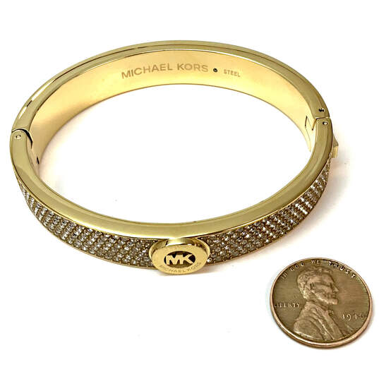 Designer Michael Kors Gold-Tone Pave Crystal Fulton Hinged Bangle Bracelet image number 3
