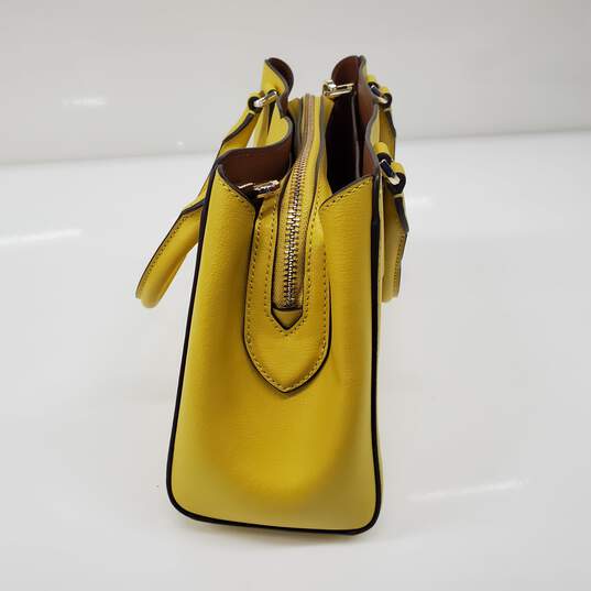 Kate Spade Tippy Triple Compartment Yellow Leather Crossbody Bag AUTHENTICATED image number 3