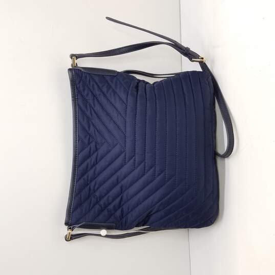 Buy the Tory Burch Women's Navy Blue Quilted Crossbody Bag | GoodwillFinds