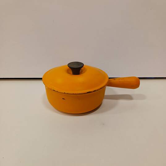 Le Creuset Yellow/Orange Cast Iron Sauce Pan image number 1