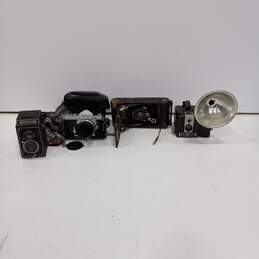 Four vintage cameras